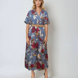 Rochie lunga cu volan centura in talie si print floral albastru