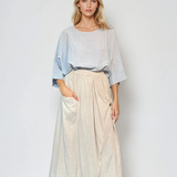 Fustă midi cu buzunare și nasture crem