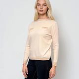 Bluză fină din tricot cu nasturi aurii crem