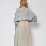 Fustă midi cu buzunare și nasture crem