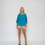 Bluză largă din in in colturi turcoaz