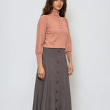 Pulover cu mâneci bufante si guler încretit roz