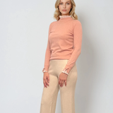 Pulover cu volan plisat roz