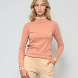 Pulover cu volan plisat roz