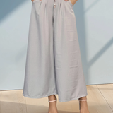 Pantaloni largi din vâscoză cu pense și curea inclusă gri