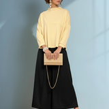 Bluză largă cu guler înalt galben