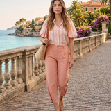 Pantaloni cu dungi și nasturi decorativi roz