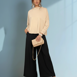 Bluză largă cu guler înalt crem