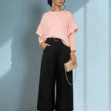 Bluză largă cu volan la umeri roz