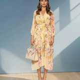 Rochie din voal cu print floral și decolteu parte peste parte galben