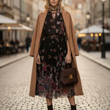 Rochie lungă din voal fluid cu volan jos și print floral negru