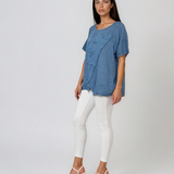 Bluză largă din in cu flori aplicate și franjuri albastru-jeans