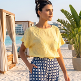 Bluză lejeră din in cu broderie florală și perforații la umeri galben PR953