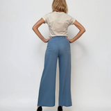 Pantaloni evazați cu fermoar și buzunare bleu