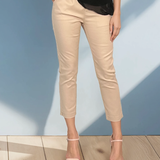 Pantaloni conici din bumbac cu șnur în talie crem