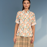 Bluză guler tunică cu un nasture portocaliu