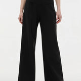 Pantaloni evazați cu clapetă buzunare ORSAY negru