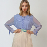 Bluza cu volan din mătase naturală și vascoză bleu