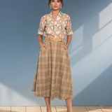 Fustă lungă cloș cu buzunare și carouri vernil