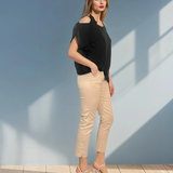 Pantaloni conici din bumbac cu șnur în talie crem