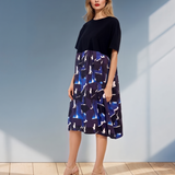 Rochie largă cu mânecă scurtă și print geometric albastru