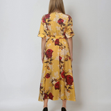 Rochie lunga parte peste parte print floral cu broșă galben
