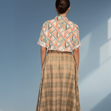 Fustă lungă cloș cu buzunare și carouri vernil