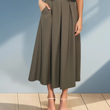 Fustă midi cu buzunare și pliuri kaki