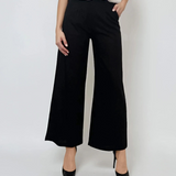 Pantaloni evazați cu fermoar și buzunare negru