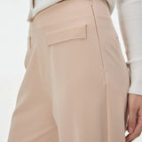 Pantaloni evazați cu clapetă buzunare ORSAY crem