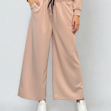 Fustă pantalon cu buzunare și șnur crem 