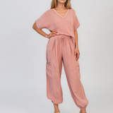 Pantaloni din in cu buzunare laterale și franjuri roz