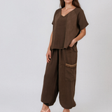 Pantaloni din in cu buzunare laterale și franjuri maro