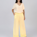 Pantaloni din in largi cu broderie jos galben