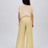Pantaloni din in largi cu broderie jos galben
