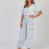 Pantaloni din in cu buzunare laterale și franjuri bleu