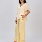 Pantaloni din in largi cu broderie jos galben
