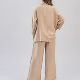 Pantaloni din in largi cu broderie jos crem