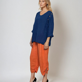 Pantaloni 3/4 din in cu buzunare și nasturi decorativi portocaliu 
