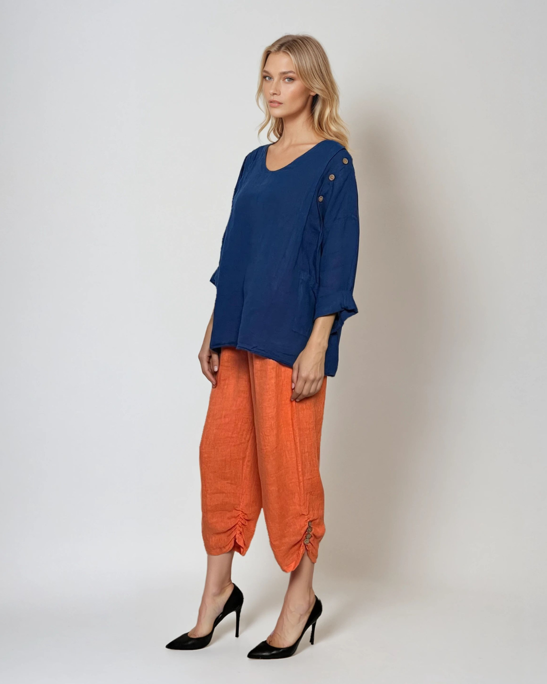 Pantaloni 3/4 din in cu buzunare și nasturi decorativi portocaliu 