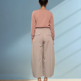Pantaloni largi cu dungă și cordon crem 