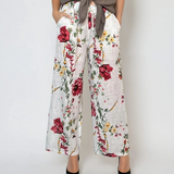 Pantaloni lungi cu print floral și buzunare alb 