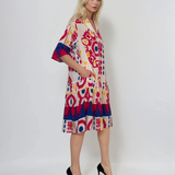 Rochie vaporoasă cu print floral și mânecă clopot ciclam 