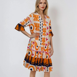 Rochie vaporoasă cu print floral și mânecă clopot portocaliu 