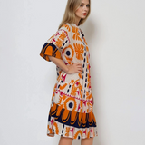 Rochie vaporoasă cu print floral și mânecă clopot portocaliu 