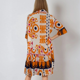 Rochie vaporoasă cu print floral și mânecă clopot portocaliu 