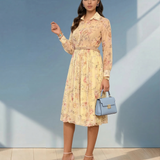 Rochie vaporoasă din voal cu guler tip cămașă și print floral galben 